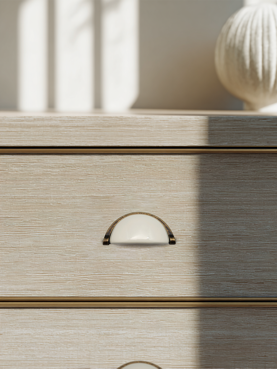 Semi-circle cabinet pull handle for modern nightstands.