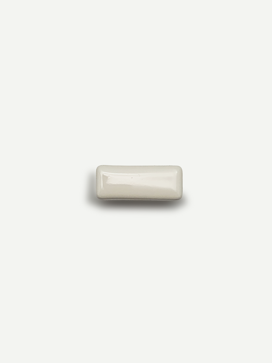 White rectangle cabinet hardware for contemporary kitchens.