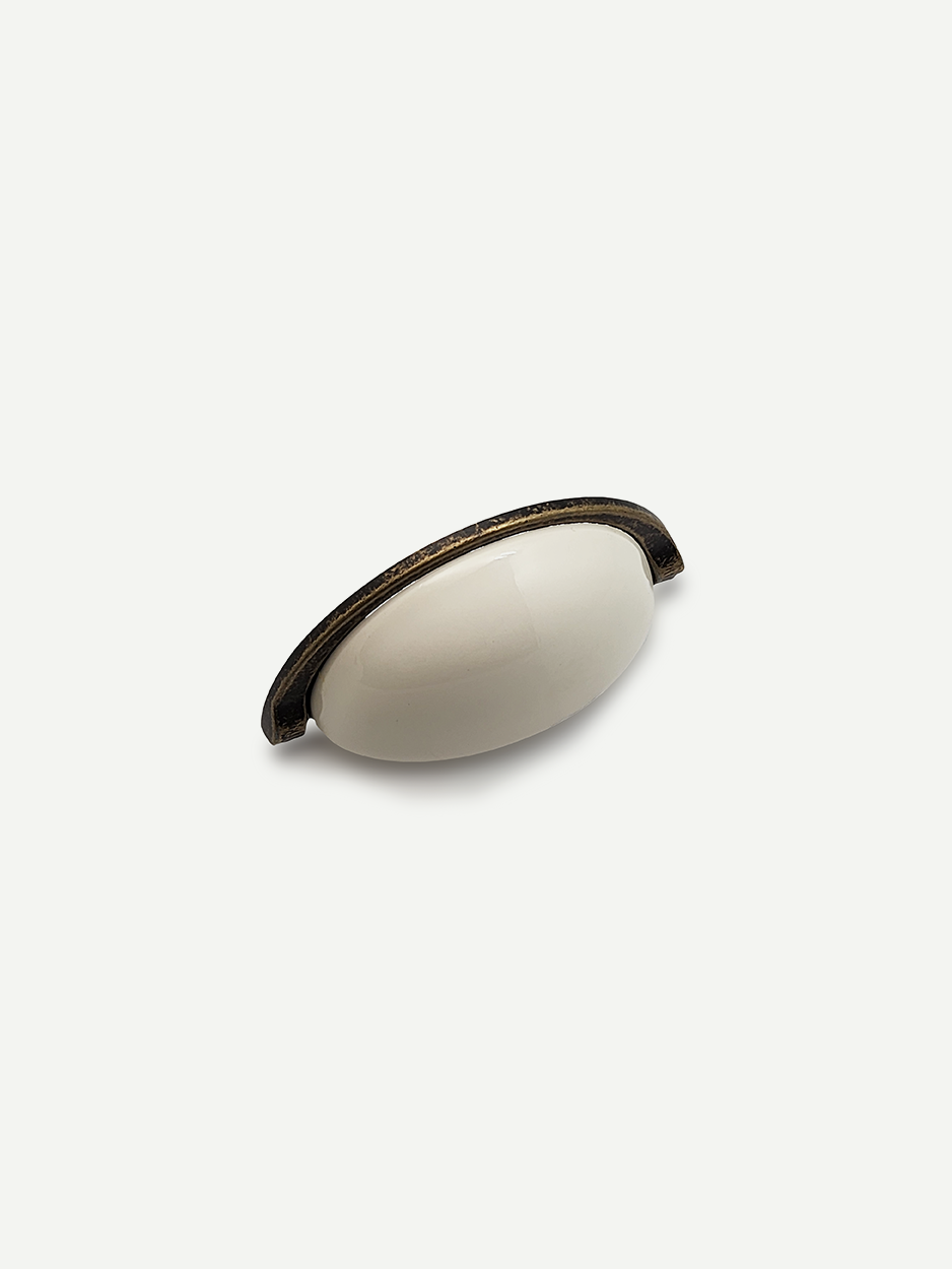 Brass semi-circle cabinet knob for elegant storage console table.