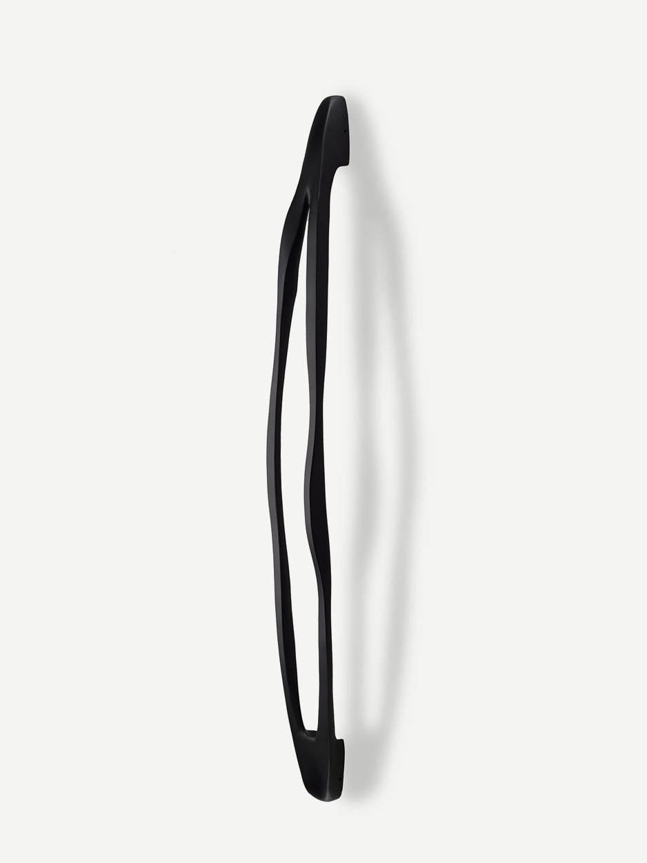 Unique sculptural front door handles in black matte