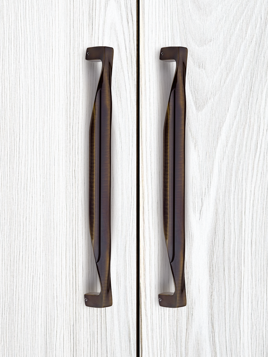 Decorative wardrobe handles in glossy bronze for modern home