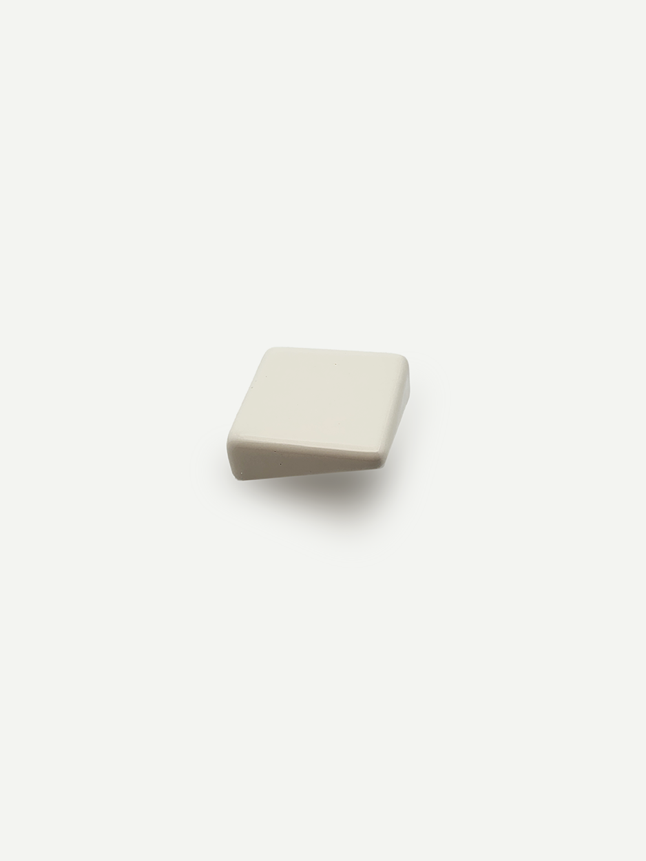 Ceramic white knobs for luxury dresser and wardrobe drawers.