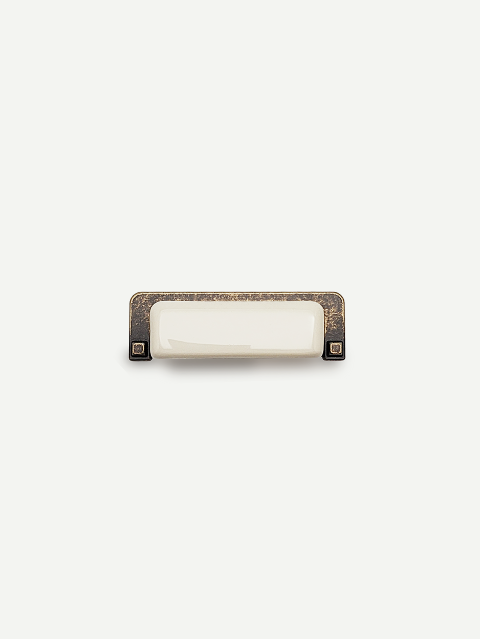 Clean white rectangular cabinet handles for modern bathrooms.