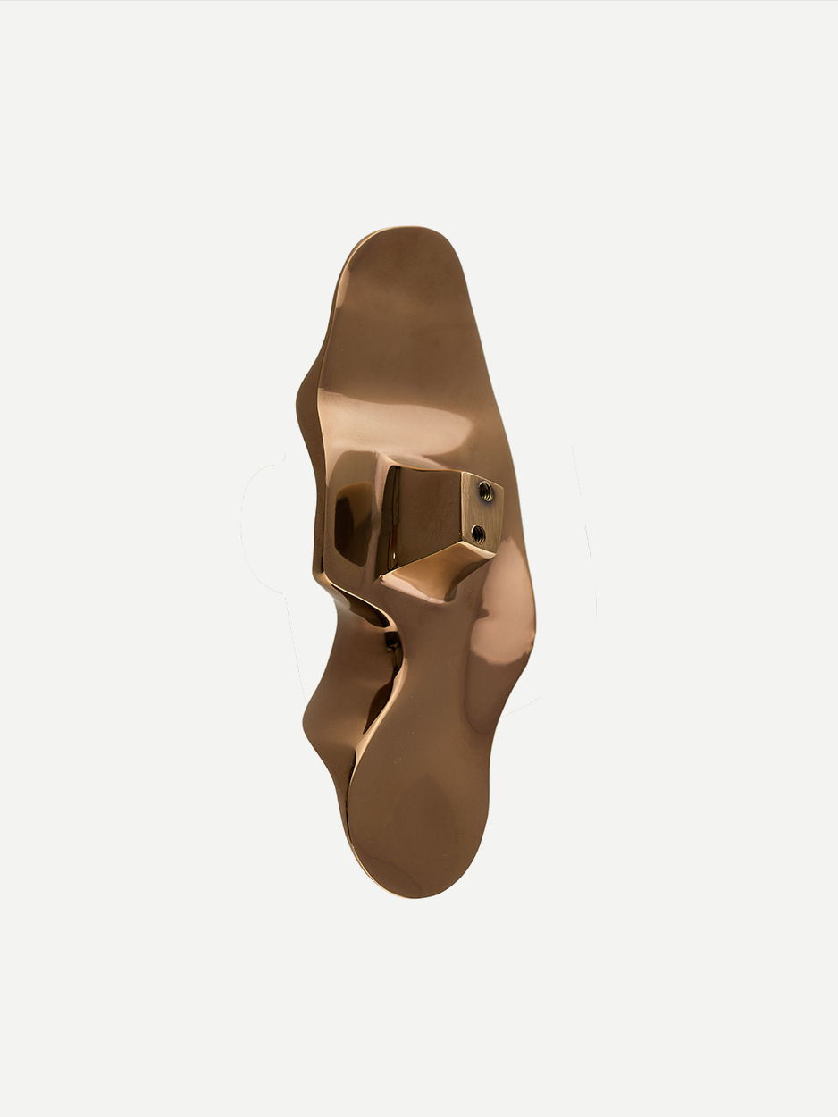Unique wardrobe knobs in handcrafted brass.